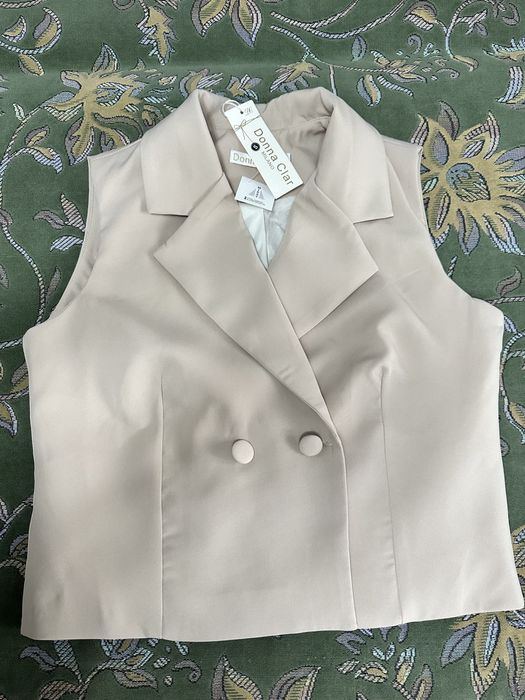 Жилетка новая