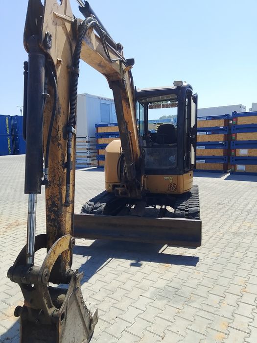 Багер  CAT 304CR
