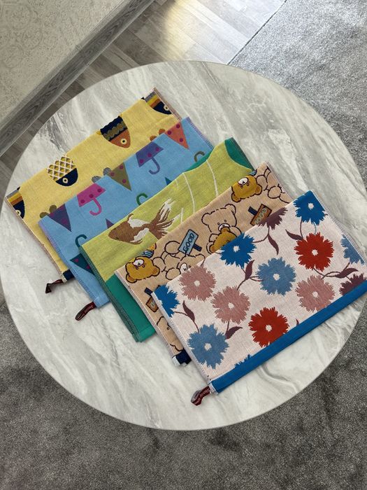 Расноцветные кухонные полотенца