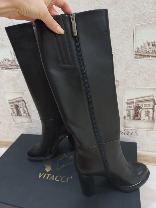 Продам новые кожаные сапоги