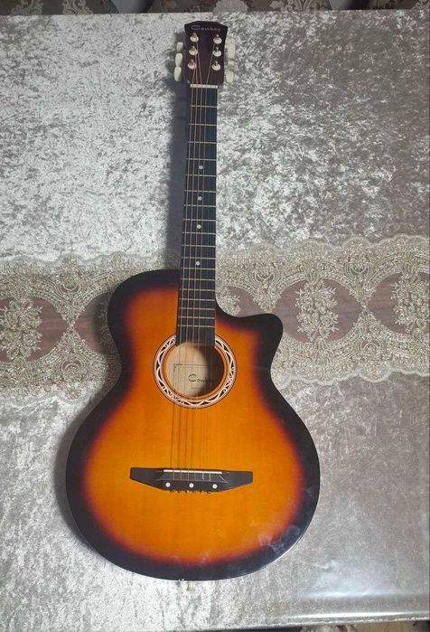 Gitara chopg'u asbobi