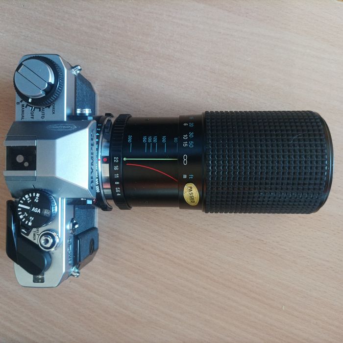 Обектив за Olympus OM още