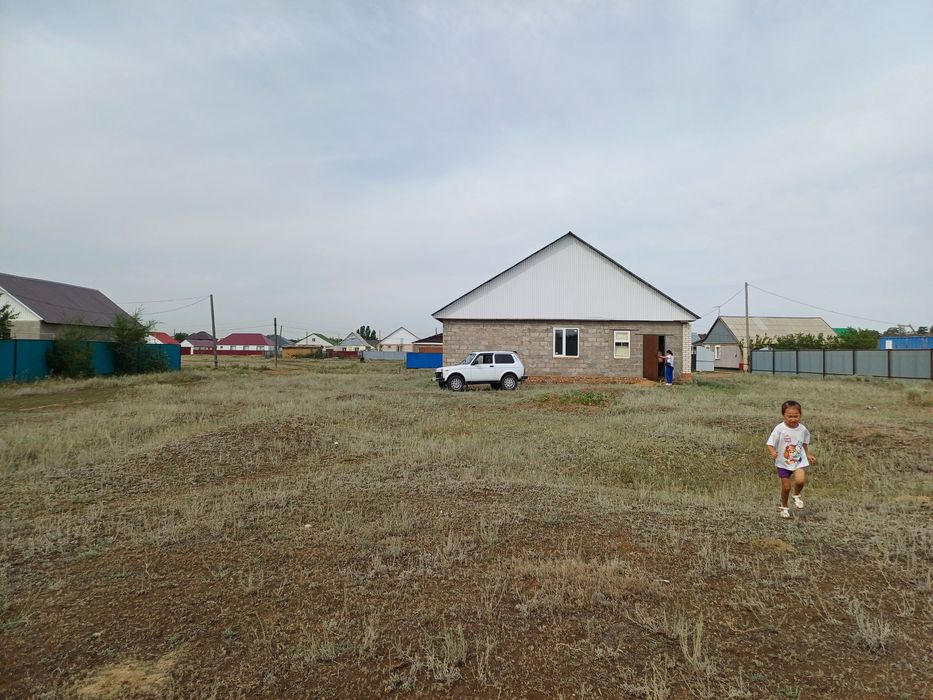 Дом с земельным участком