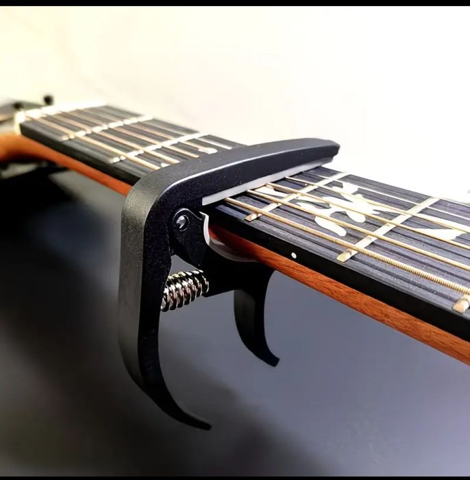 Каподастр для гитары