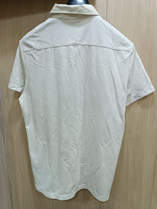 Оригинальная поло Uniqlo
