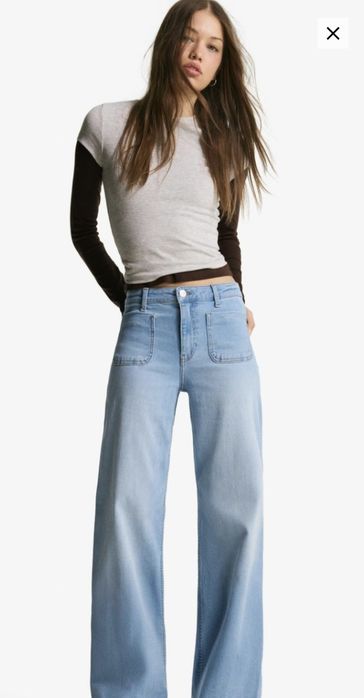 Джинсы голубые BERSHKA