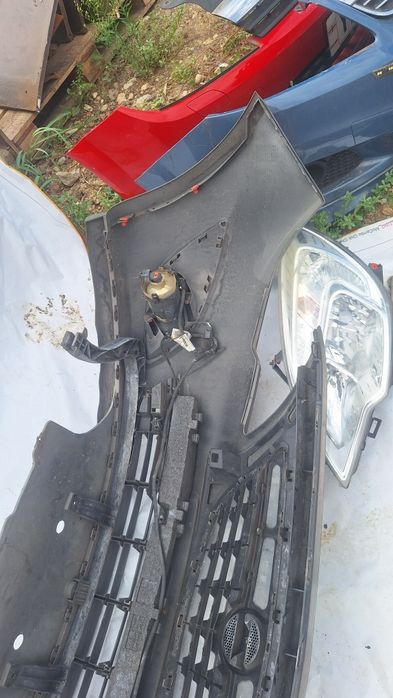 Bara fata opel meriva 2013 faruri triple grile proiectoare