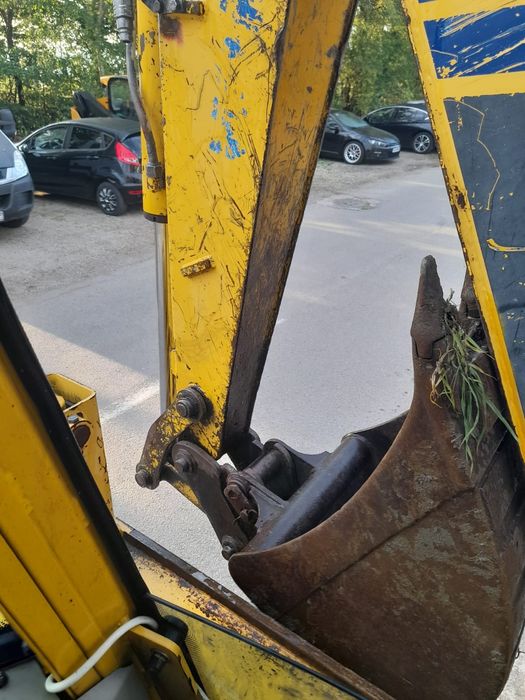 Buldoexcavator komatsu 93 r