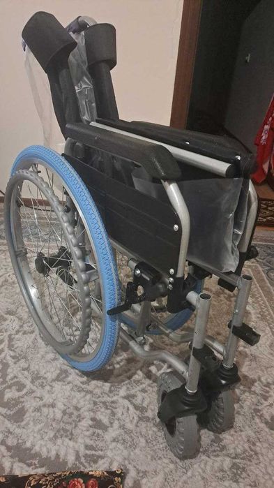 Имконияти чекланганлар учун аравача, коляска