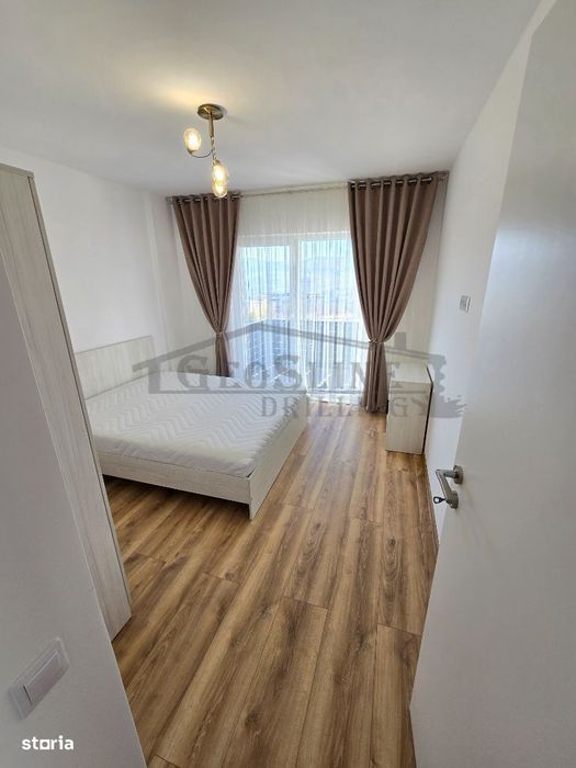 Apartament 2 dormitoare 1 open-space Parcare subterană privată inclusă