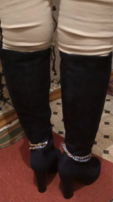 Продам новые сапоги