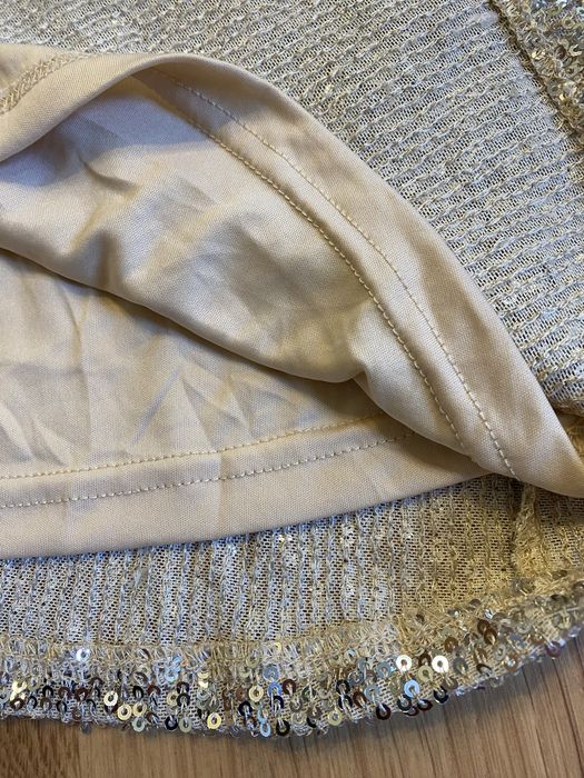 Поодаю юбку из ткани с пайетками