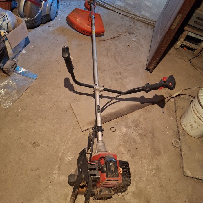 Триммер косить траву