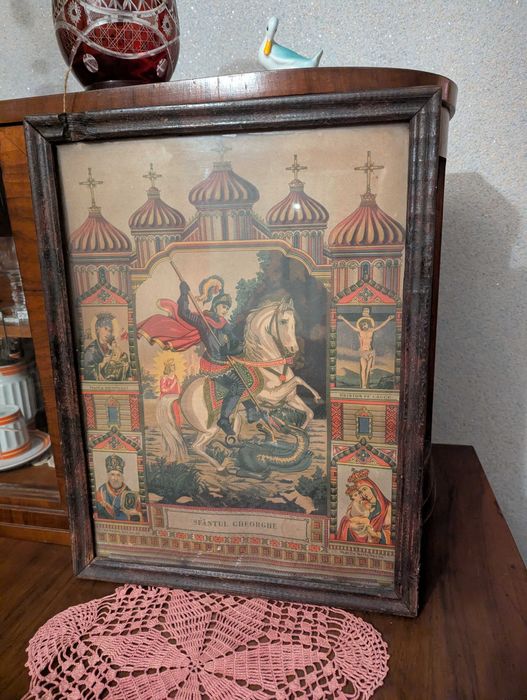 Tablou vechi cu icoana Sfântului Gheorghe, în cadru original.