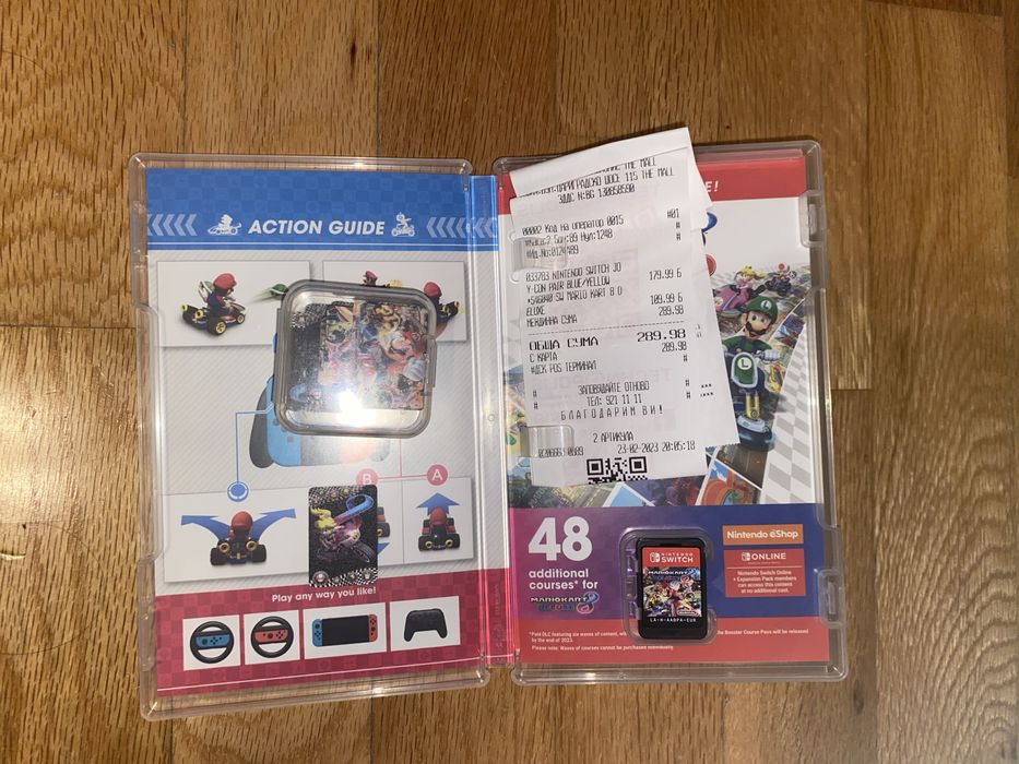 Nintendo switch lite + joycons + 128gb sd crad + Mariokart 8 Delux