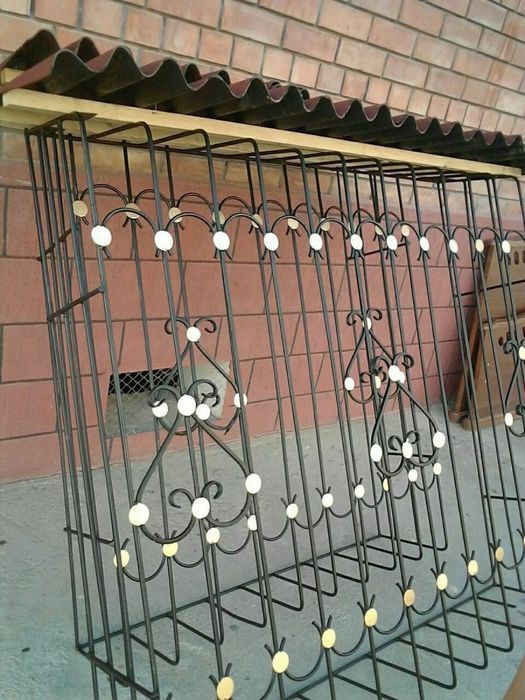 Решётки , перила , козырьки.