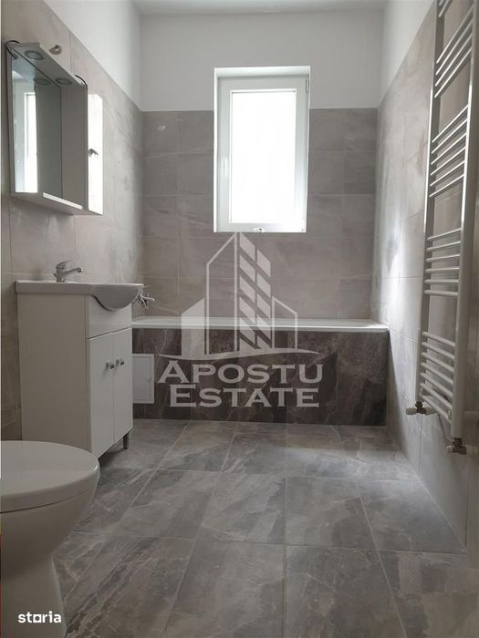 Apartament spatios cu 2 camere etaj intermediar in spate la hotel IQ
