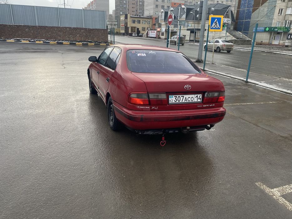 Тойота Carina e