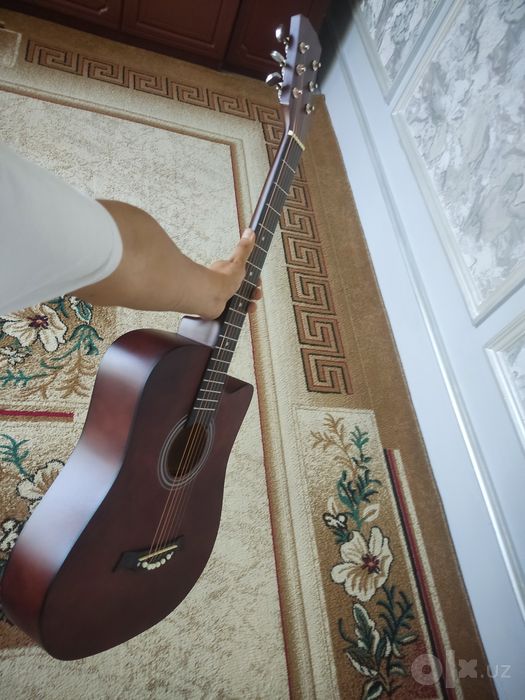 Clasic gitara yangi 2 3 marta ishlatilgan holos xolati chotki