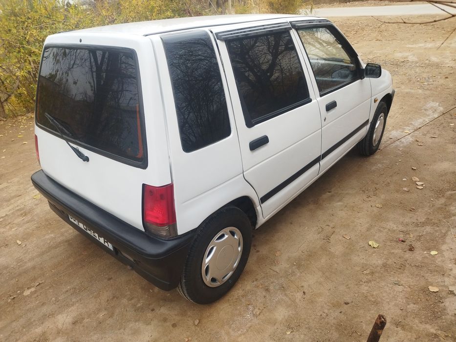 tico  1997 yil gazda