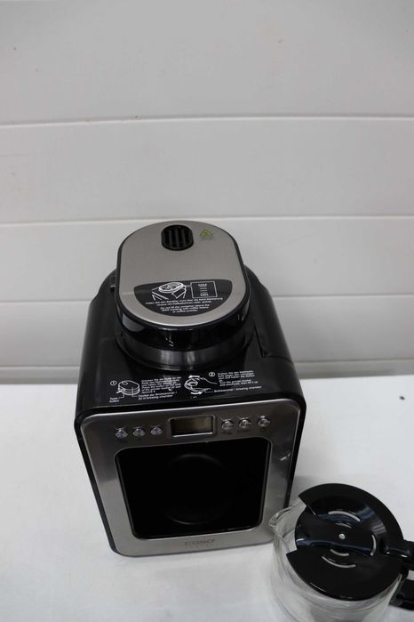 Компактна шварц кафемашина CASO Coffee с мелачка, 4 чаши кафе, подходяща и за предварително смляно кафе, LCD дисплей, таймер