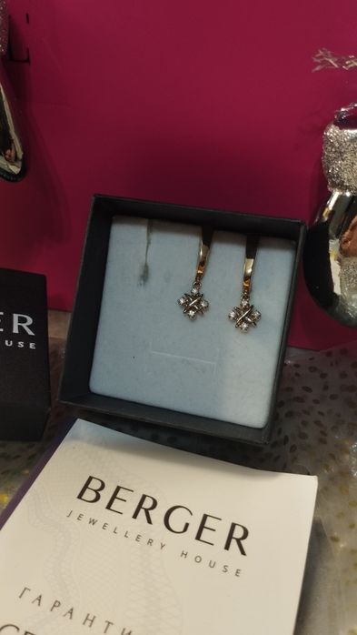 Продам золотые серьги