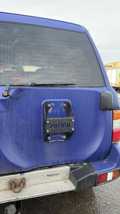 Стойка на мястото на резервната гума