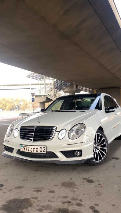 Бампер на Mercedes W211 (E-Class) стиль AMG 63 до рест / рест