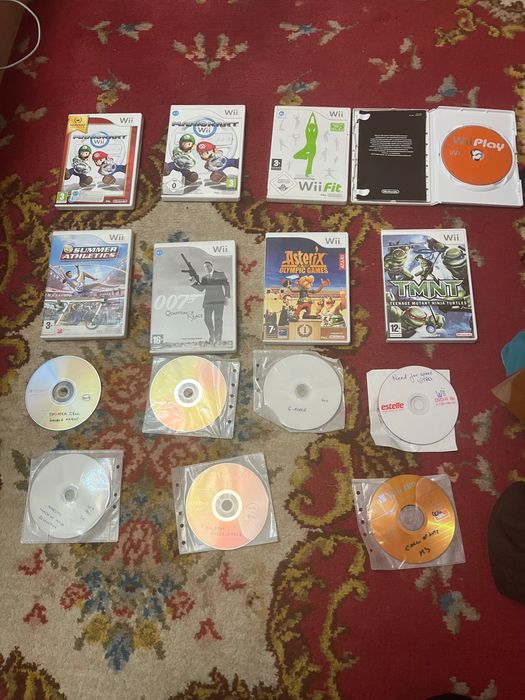 Nintendo wii 2006+accesorii și multe jocuri
