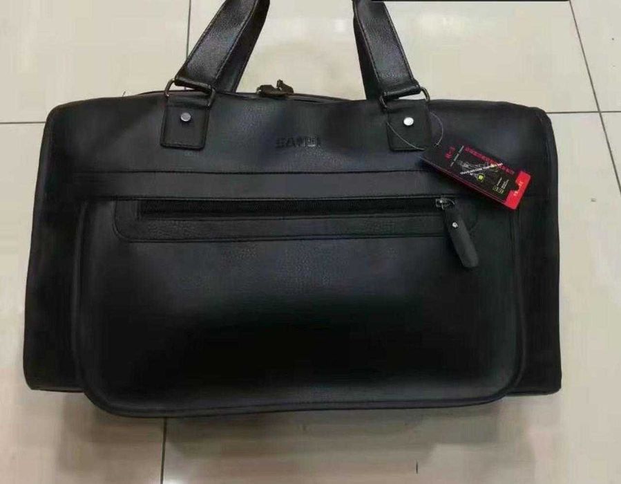 Стильные  кожаные дорожные сумки (0668)