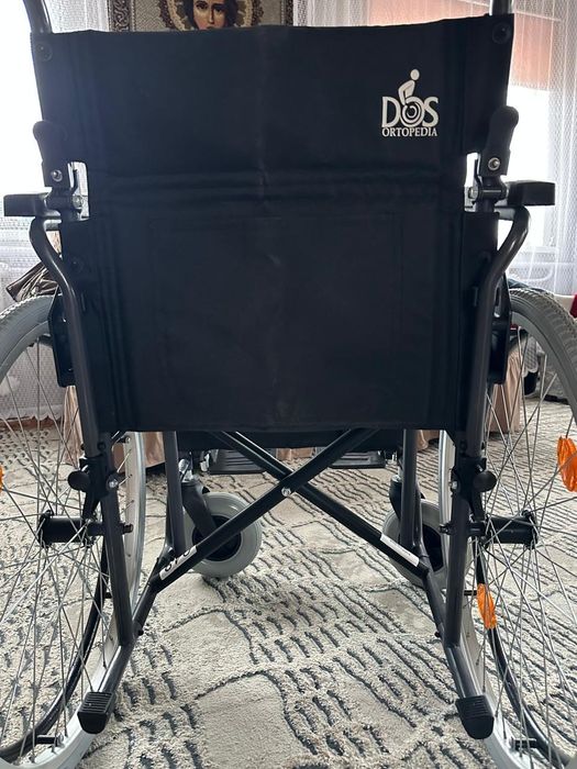 Инвалидная коляска