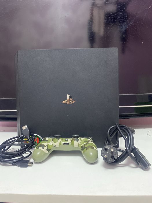 Sony PlayStation 4 Pro 1TB (CUH-7108B) + 8игр (FC24,MK11,GTA5)