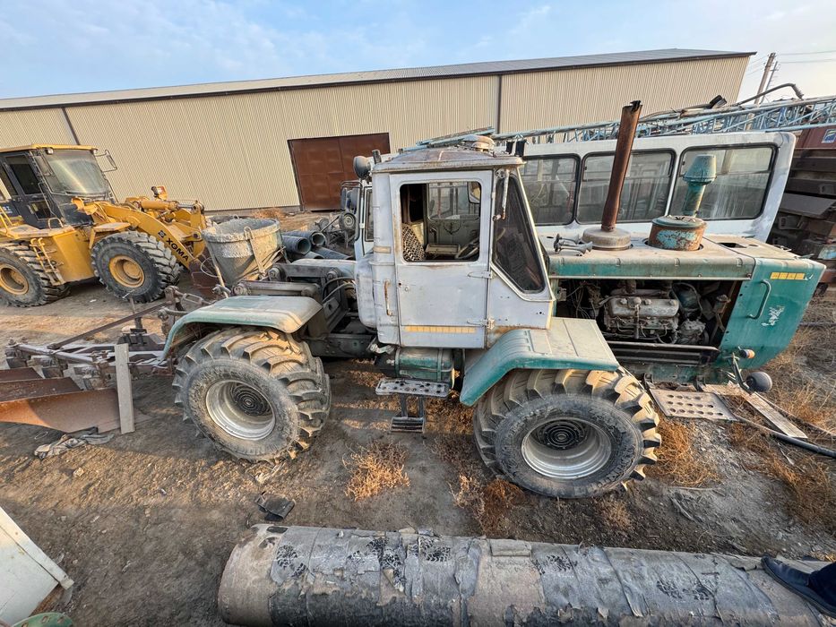 Продаётся Трактор Т-150, плуг и скрепер комплект