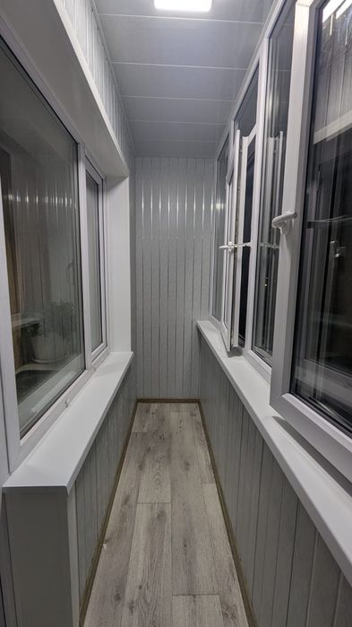 Балкон и пластиковые окна