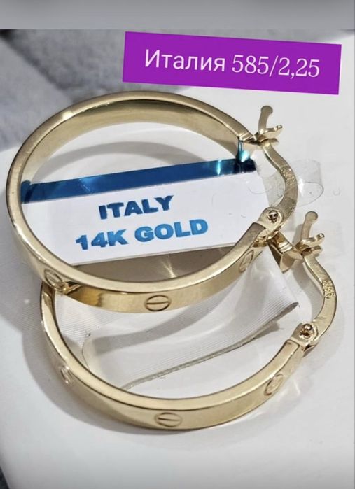 Продам золотые серьги новый