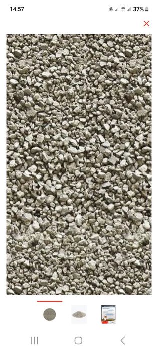 Наполнитель комкующиися и впитывающиися