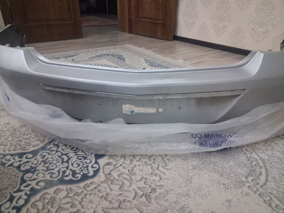 Задний бампер Шевролет Кобальт