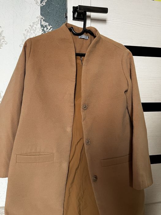 Женская  одежда.