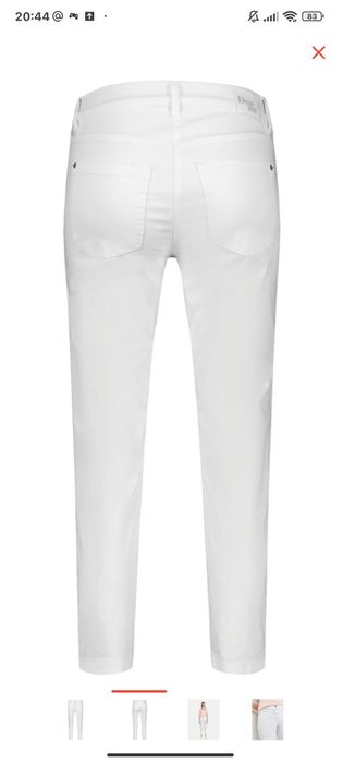 Джинсы skinny молочного оттенка.