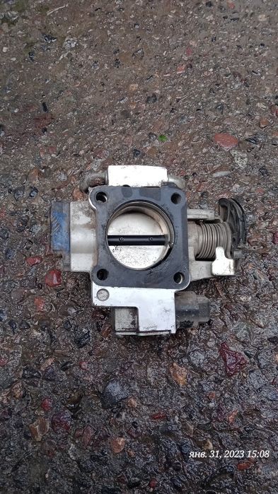 Заслонка Nexia 1.5 Donc