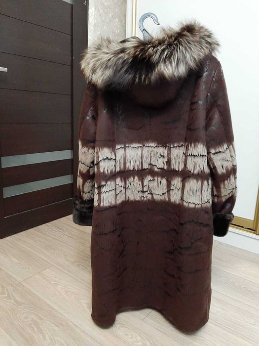 Новая дубленка с этикеткой