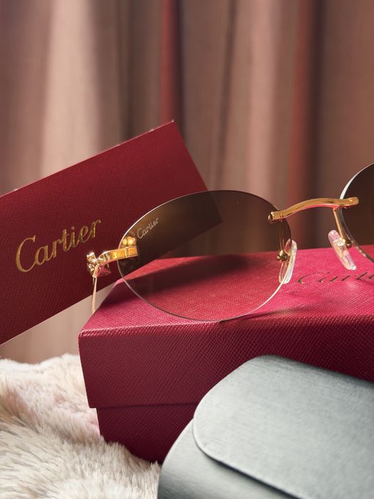 Ochelari de soare Cartier – model rotund fără ramă, auriu, unisex
