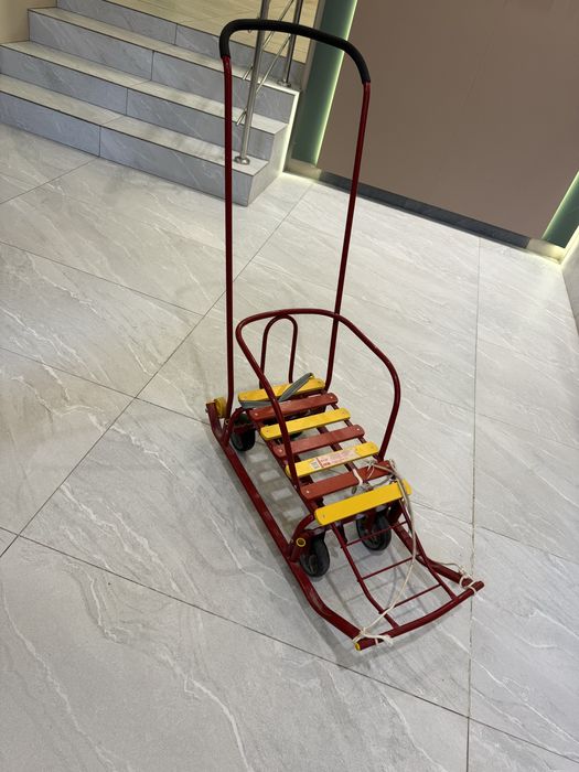 Санка на колесах