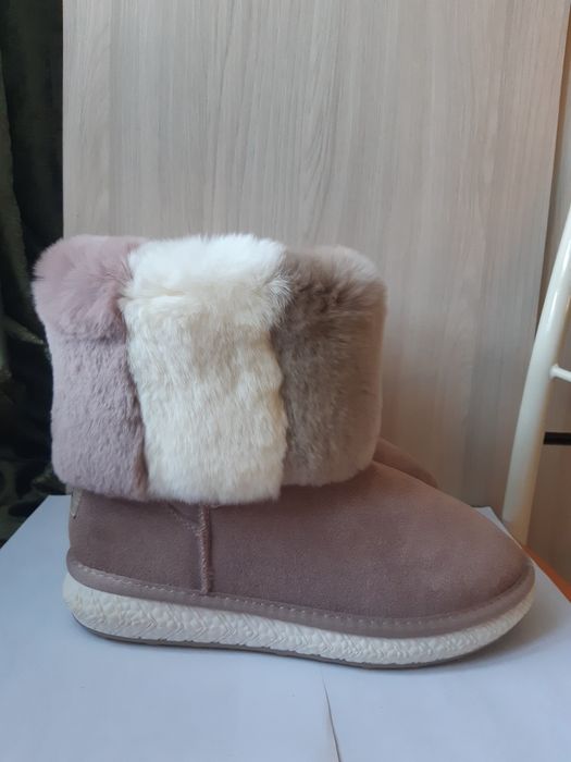 Продам новые сапоги.