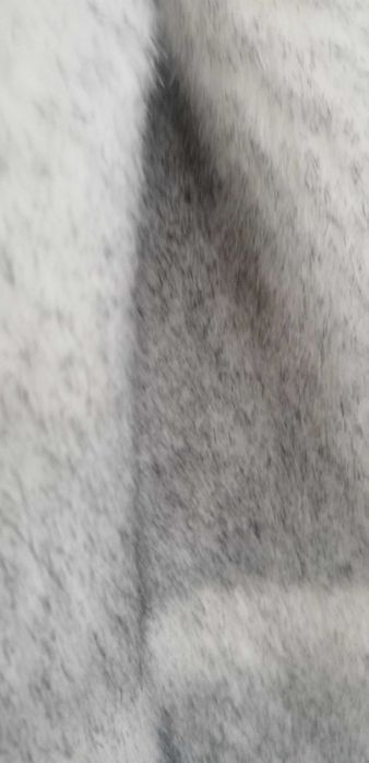 Дамско пухкаво елече