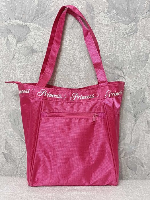 Розовая сумка для девочки.