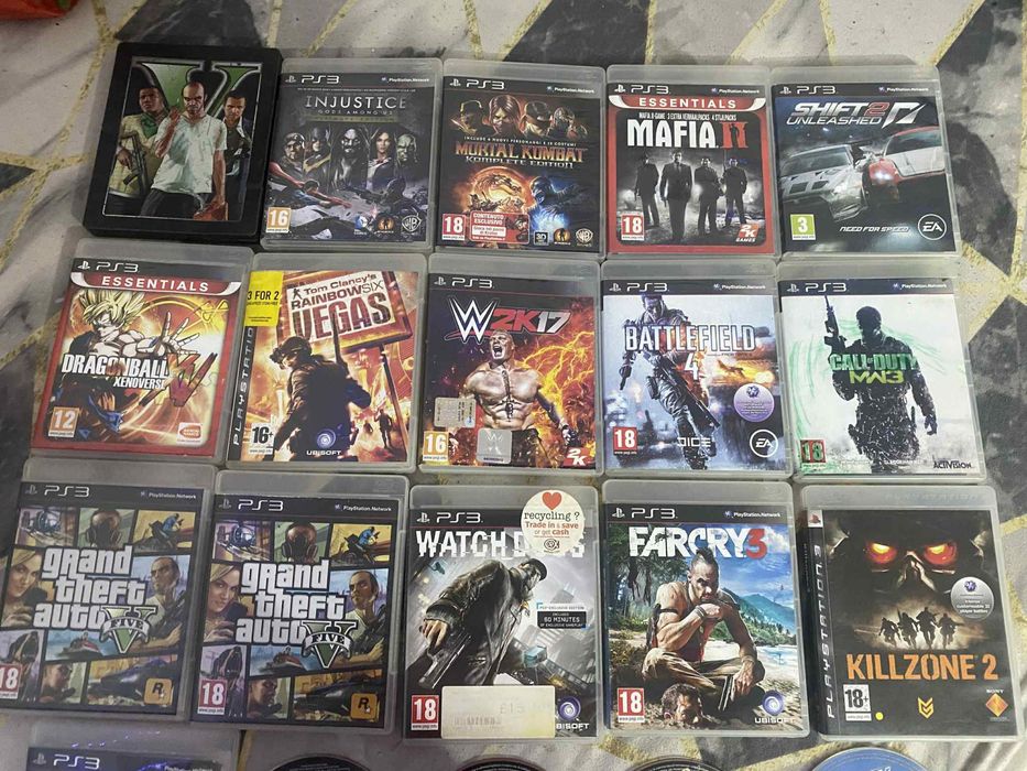 PlayStation 3 Slim + 2 manete + 21 jocuri – pachet complet