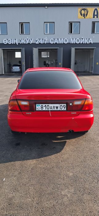 Мазда 323 год 1995