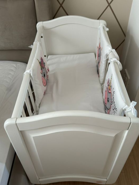 Колыбель с маятником