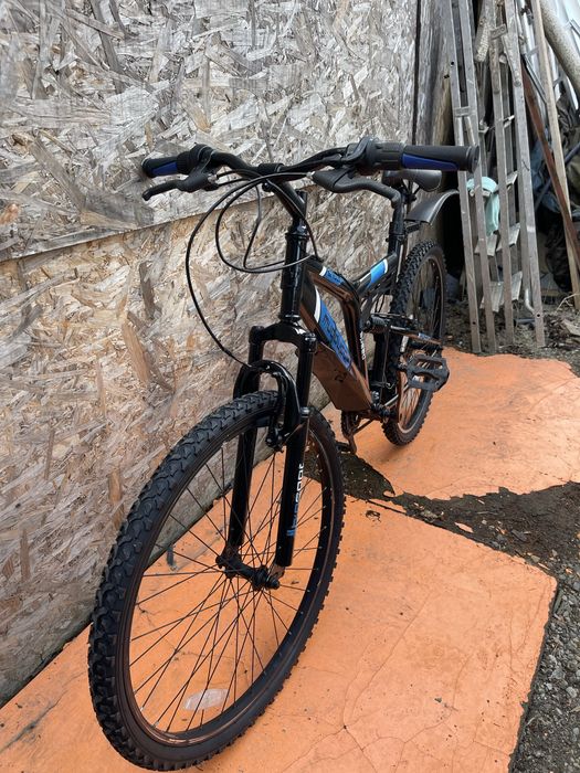 Bicicleta muddyfox roti 26” cu suspensii